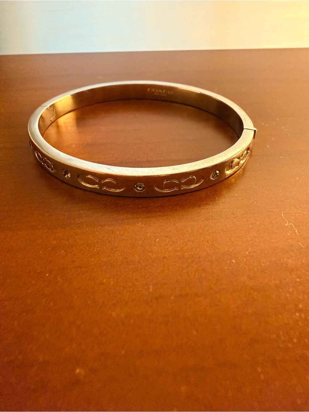 Coach Silver-Tone Logo Bangle with Crystal Accents